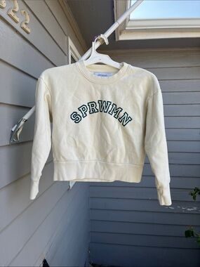 SPRWMN Cream Crewneck Sweatshirt with Green Arch Logo shrunken sweatshirt